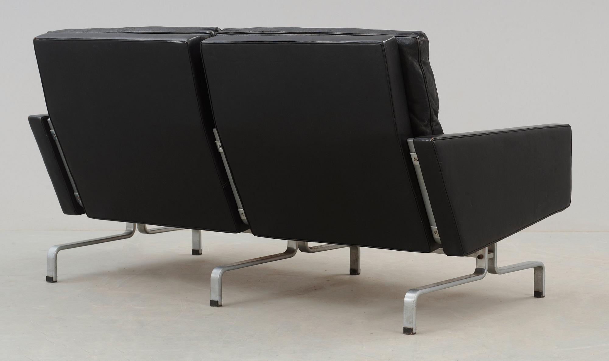 A Poul Kjaerholm 'PK-31-2' black leather and steel sofa, E Kold Christensen, Denmark.