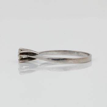 RING, 18k vitguld med briljantslipad diamant ca 0,20ct enl gravyr.