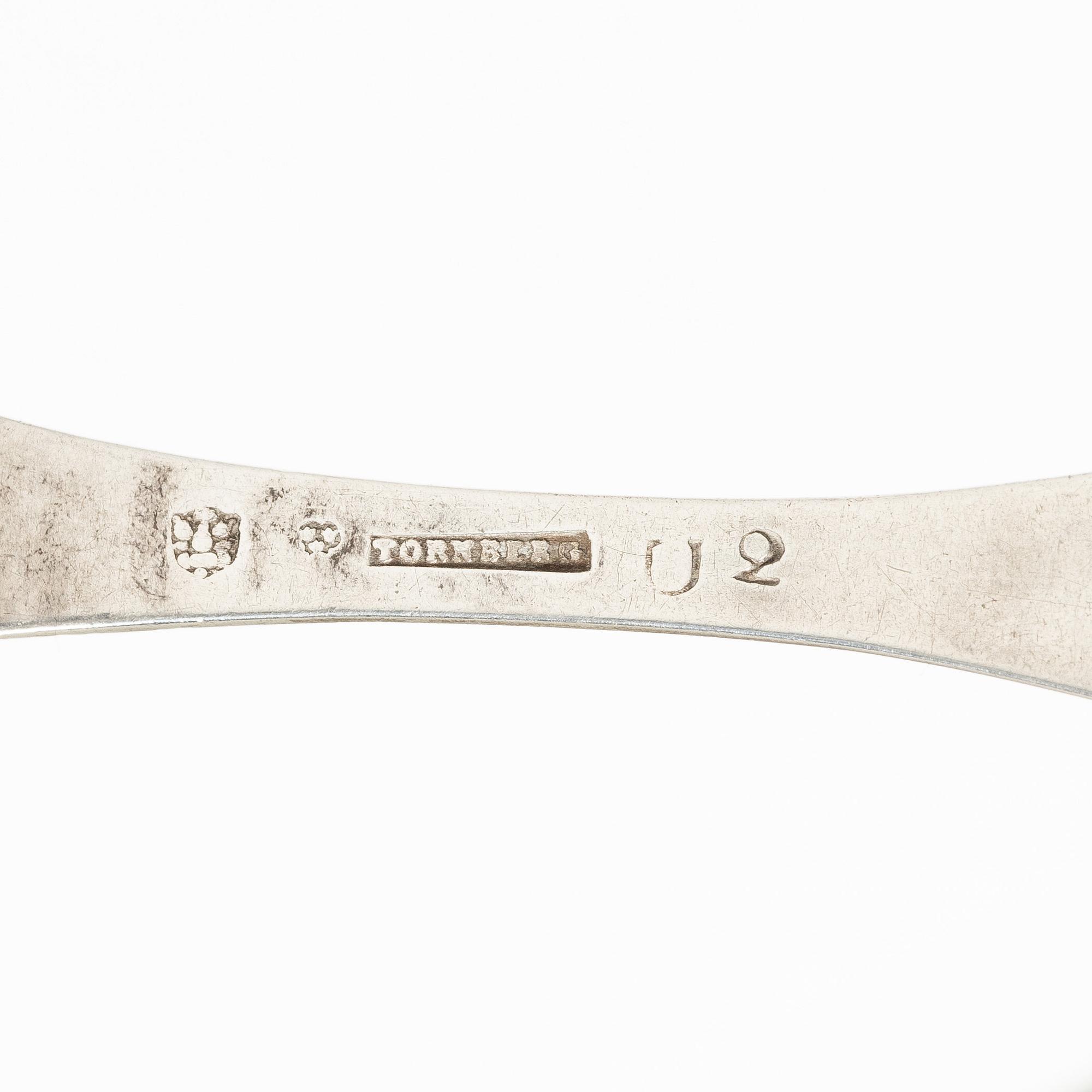 Three Swedish silver tablespoons with fiddle-pattern handles, circa 1800.