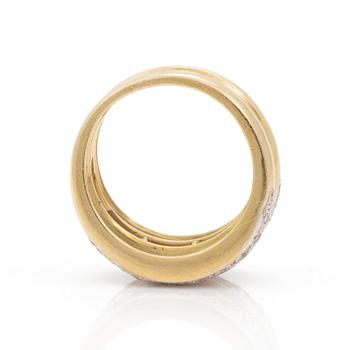 A step cut ruby and brilliant cut diamond ring. Total carat weight of diamonds circa 0,80ct.