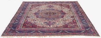 A semi-antique Kirman carpet, South Persia, c. 380 x 289 cm.