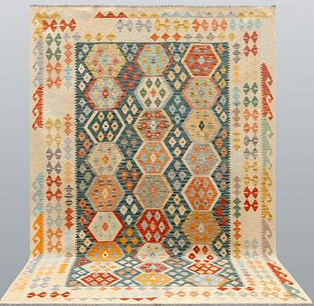 A Kilim rug, approx. 295 x 203 cm.