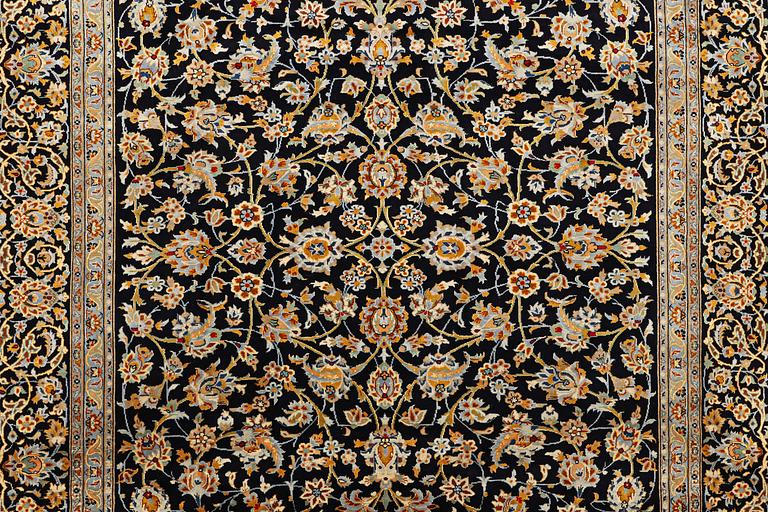 A carpet, Kashan, ca. 359 x 259 cm.