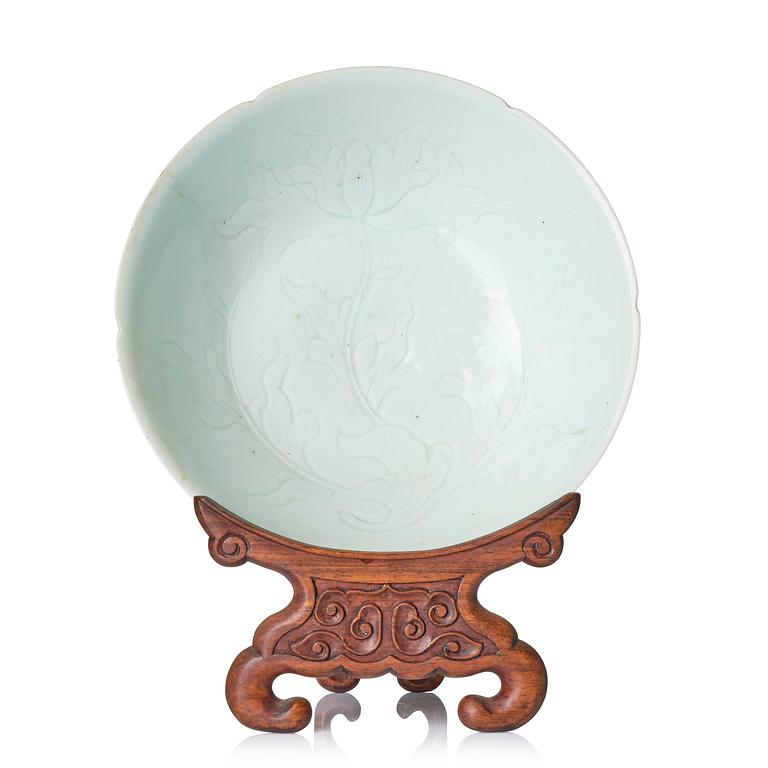 A carved qingbai foliate bowl, Song dynasty (960-1279).