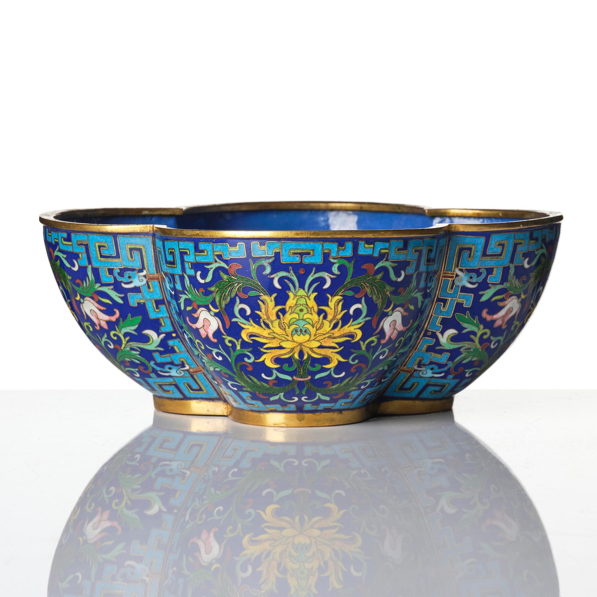 A quatre-foil  'lotus' jardiniere, late Qing dynasty.