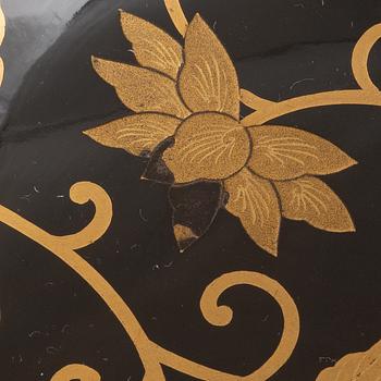 A set of six Japanese lacquer bowls with covers, 20th century.