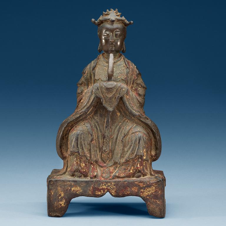 A seated bronze figure of a deity, Ming dynasty (1368-1644).