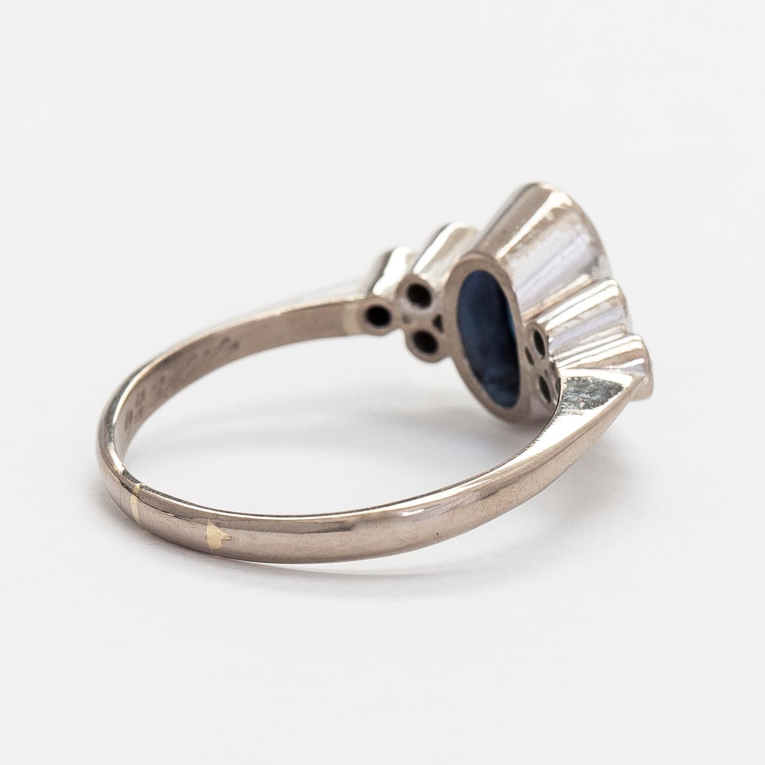 A. Tillander, ring, faceted sapphire, brilliant cut diamonds, 18K white gold, Helsinki 1983.