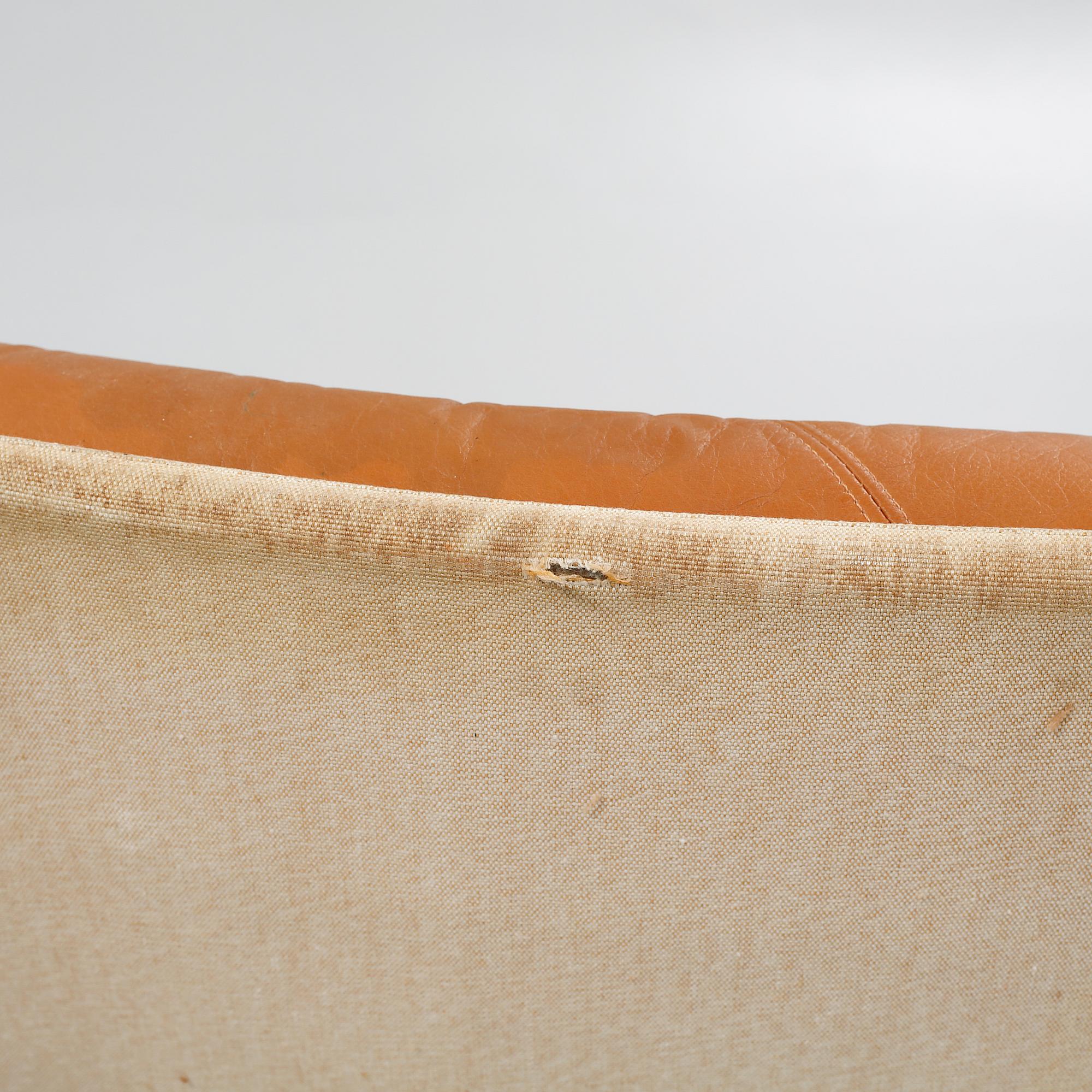 A pair of armchair and foot stools from Ikea, made in the fourth quarter of the 20th century.
