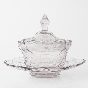 A pair of lidded glass bowls with stands, late 19th century.