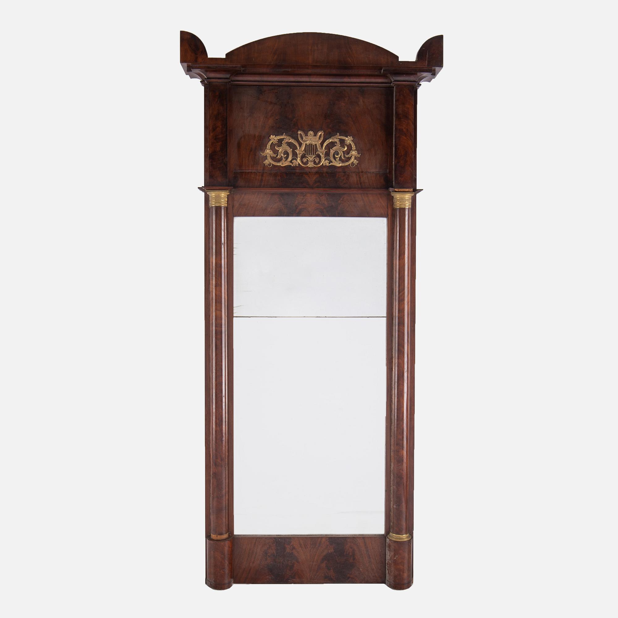 A Swedish Empire mirror and console table, first half of the 19th century.