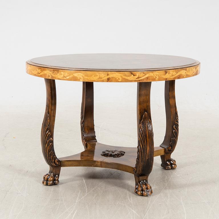 A 1940s birch coffee table.