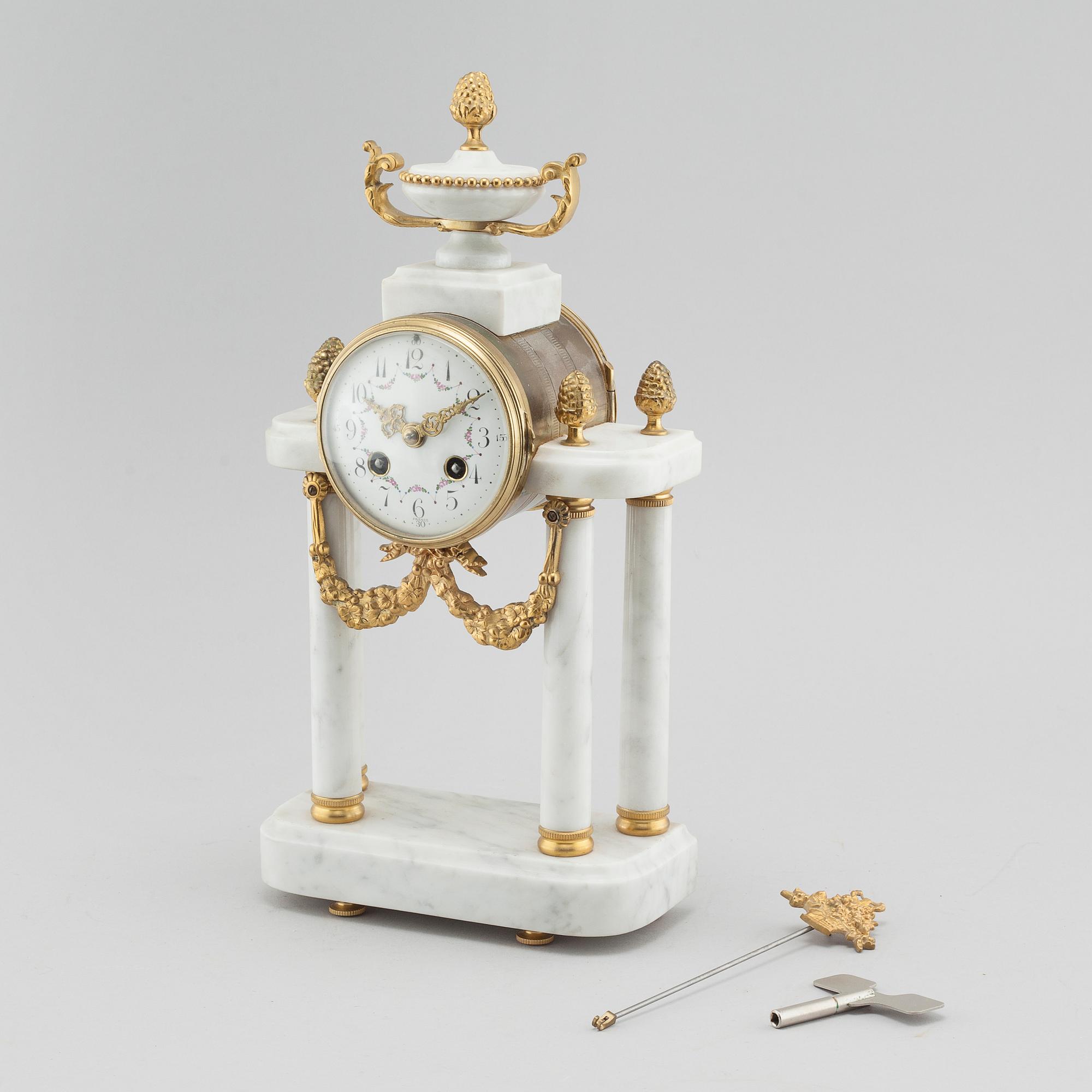 A French Louis XVI-style mantle clock, first half of the 20th century.
