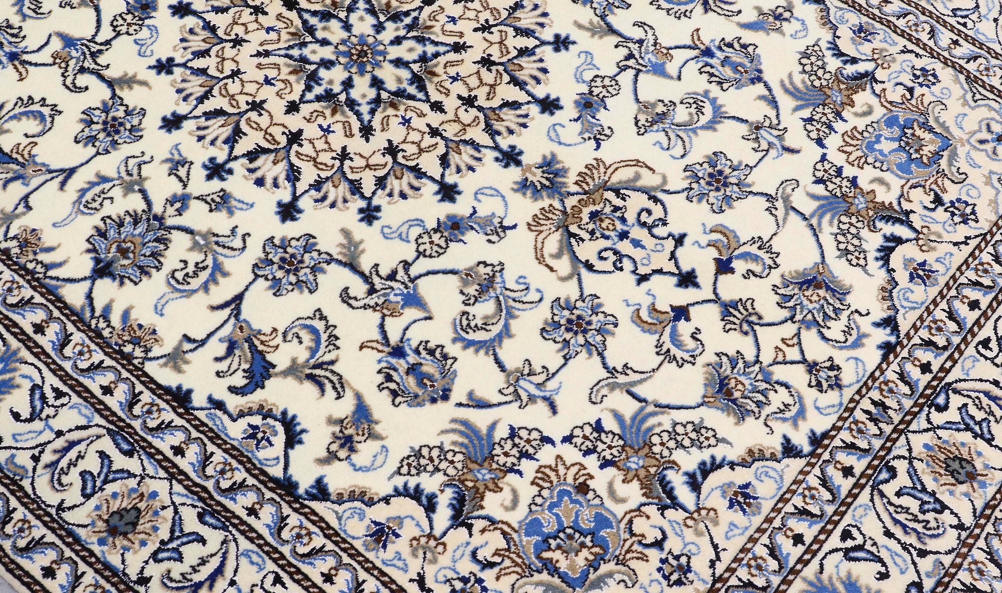 A rug, Nain part silk, ca 235 x 160 cm.