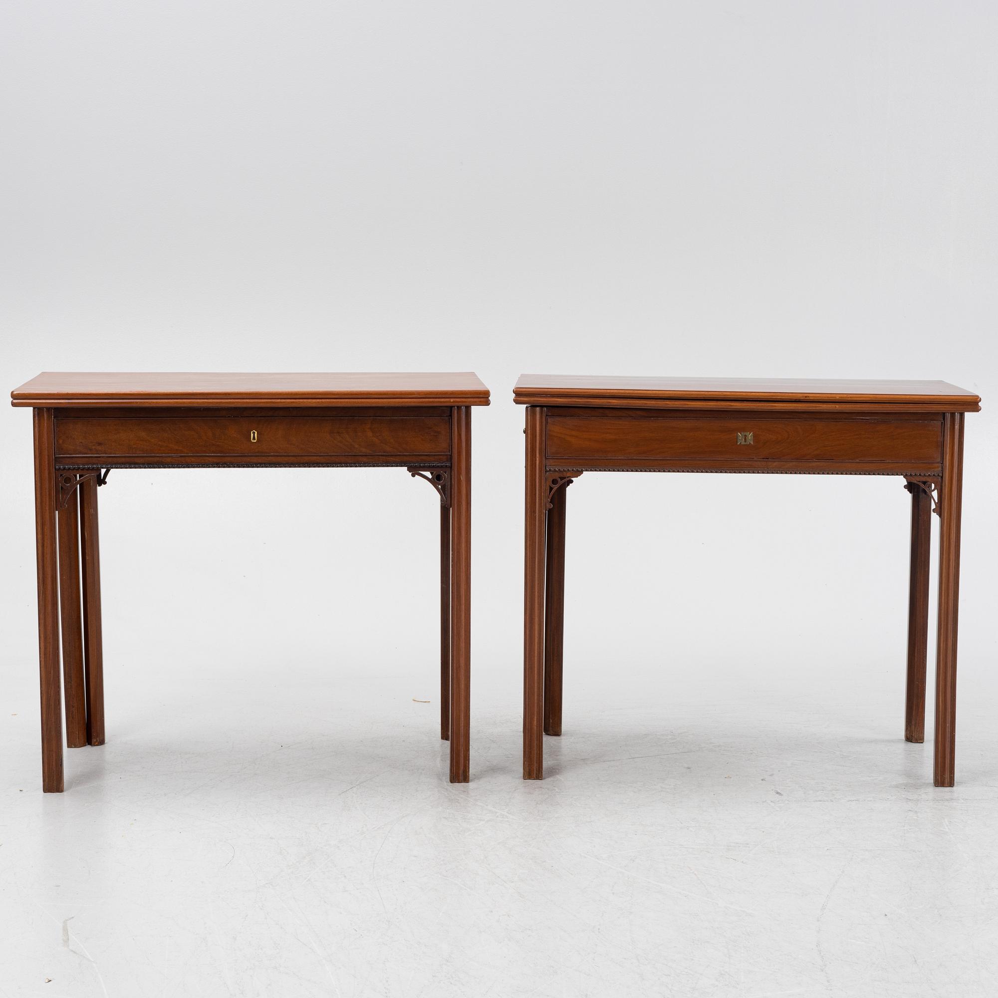 A macthed pair of late Gustavian mahogany veneered card tables one by C D Fick, Stockholm 1776-1806.