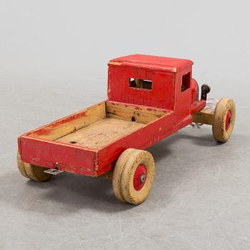 A TOY CAR, mid 1900s.