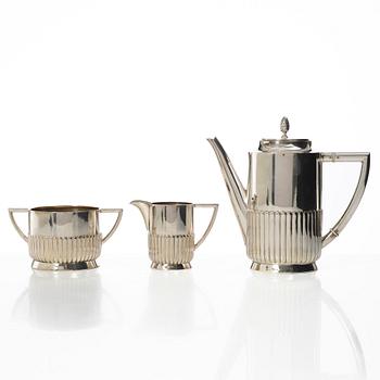 Guldsmedsaktiebolaget (GAB), A Swedish silver coffee pot, cream jug and sugar bowl, mark of GAB, Stockholm 1918-1919.