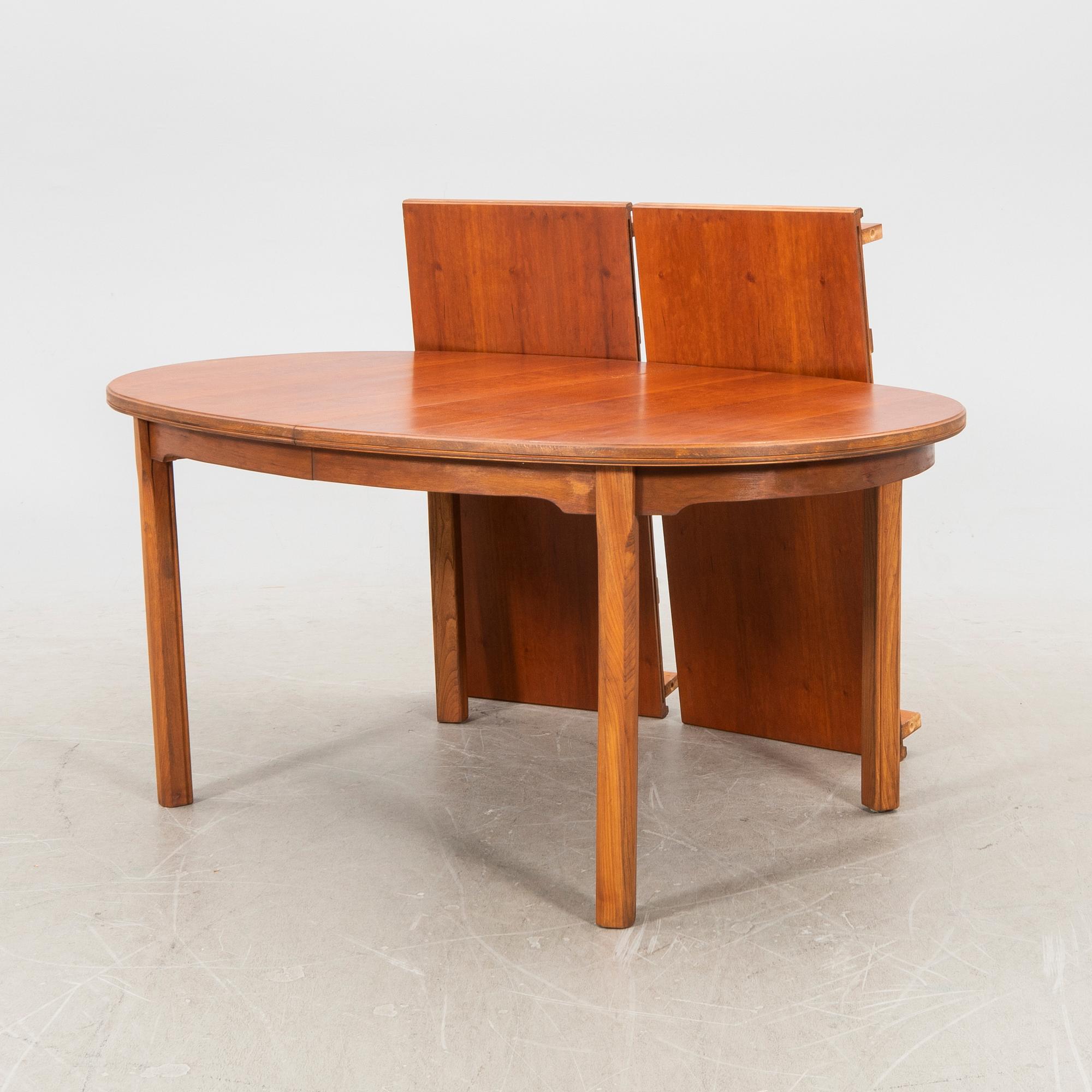 A walnut dining table, "Bristol" 1960s.