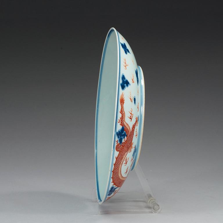 A blue and white and red overglaze dragon dish, presumably Republic with mark in underglaze blue.