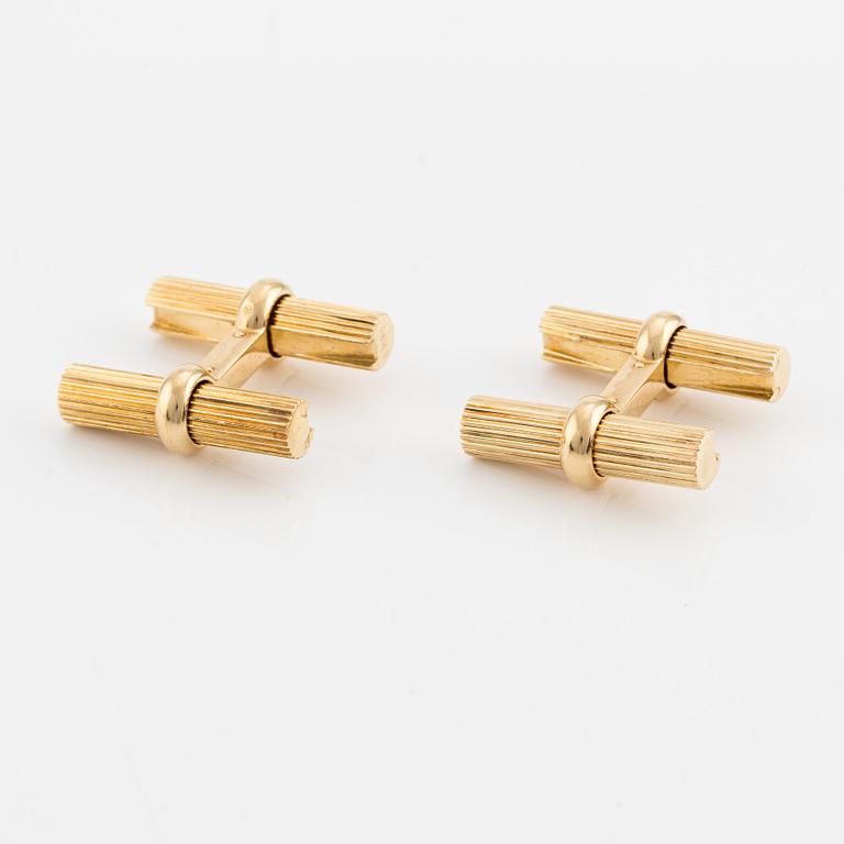 Van Cleef & Arpels, cufflinks with interchangeable parts in 18K gold and stone.