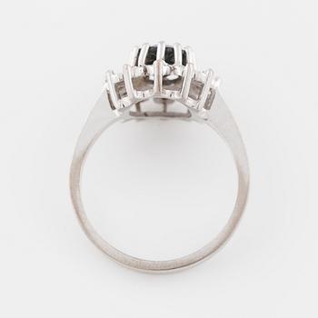 A sapphire and brilliant cut diamond ring with Swedish hallmark.