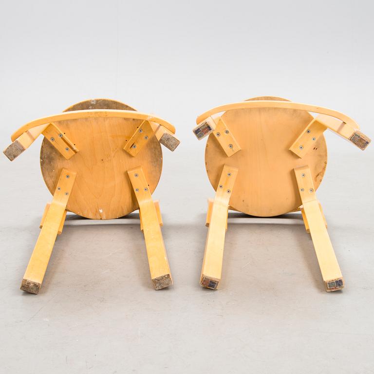 Two K65 bar stools, Artek, end of the 20th Century. Model designed in 1935.