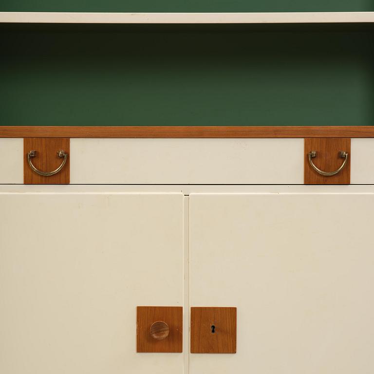 Josef Frank, a set of three bookcases model "B 2255", Firma Svenskt Tenn, mid-20th century, provenance Estrid Ericson.