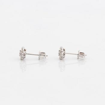 Brilliant-cut diamond earrings.