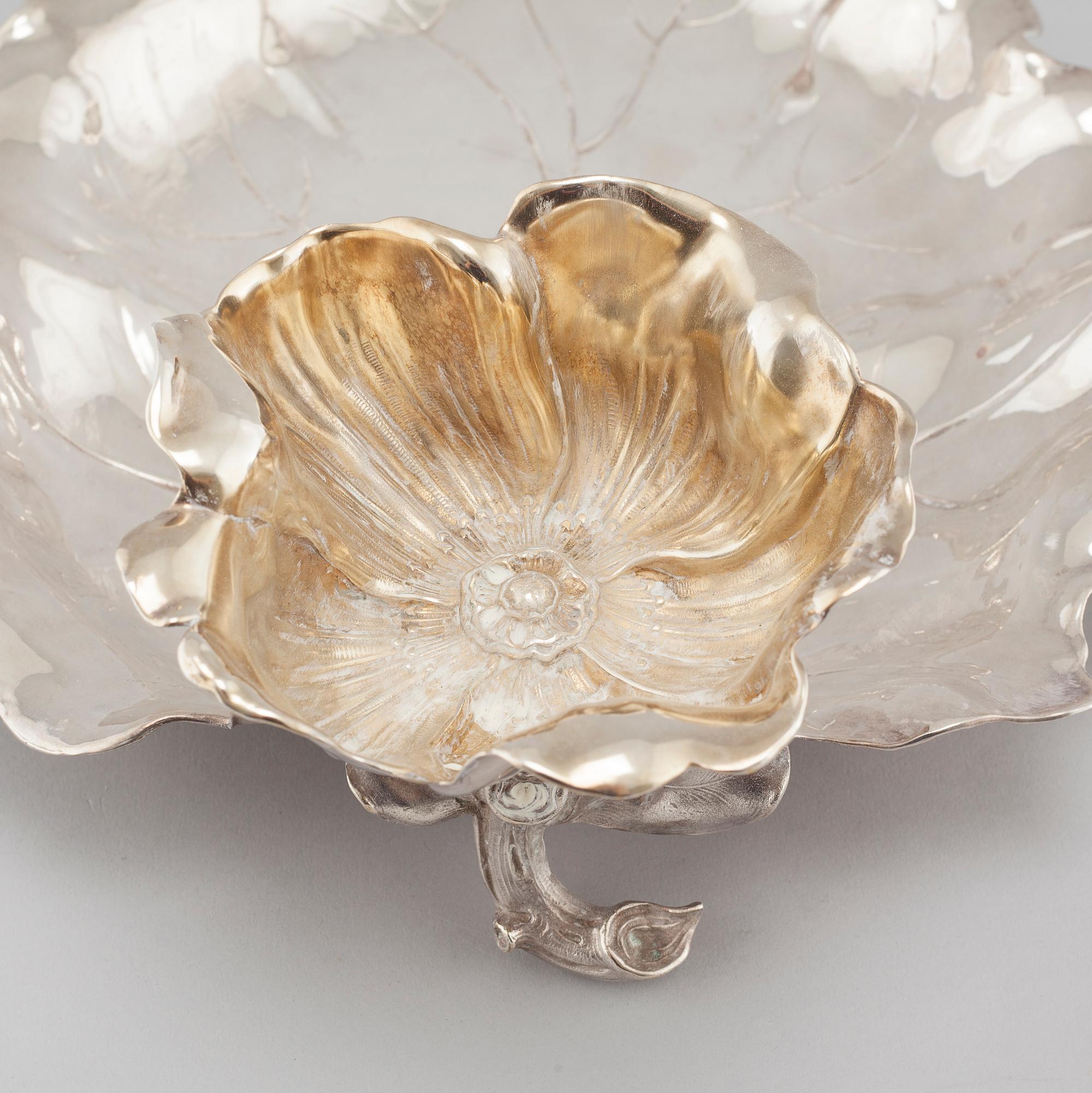 A silvered metal serving dish, early 20th century.