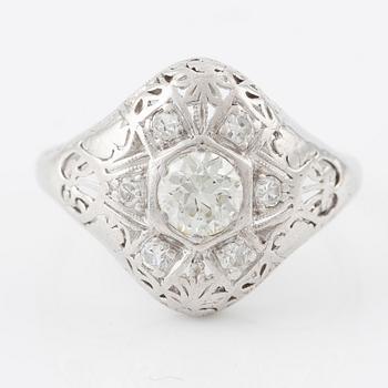 Ring with brilliant-cut diamond and octagon-cut diamonds.