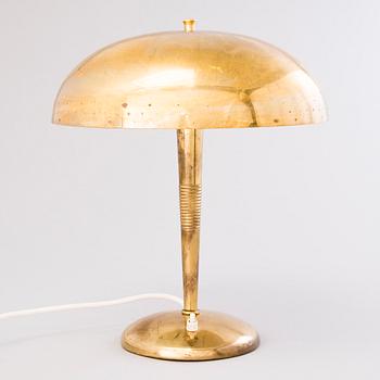 A mid-20th century table lamp for Itsu, Finland.