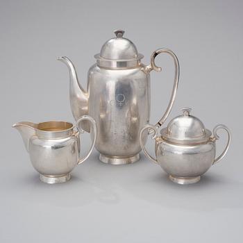 A silver coffee pot, sugar bowl and creamer by A. Tillander, Helsinki 1939. Total weight circa 1600 g.