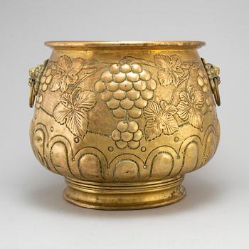 A 19th century large brass flower pot.