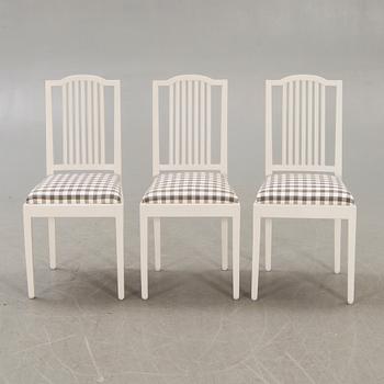 A set of six painted chairs around 1900.