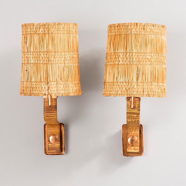 PAAVO TYNELL, A PAIR OF WALL LAMPS. Marked Taito. 1940-1950s.