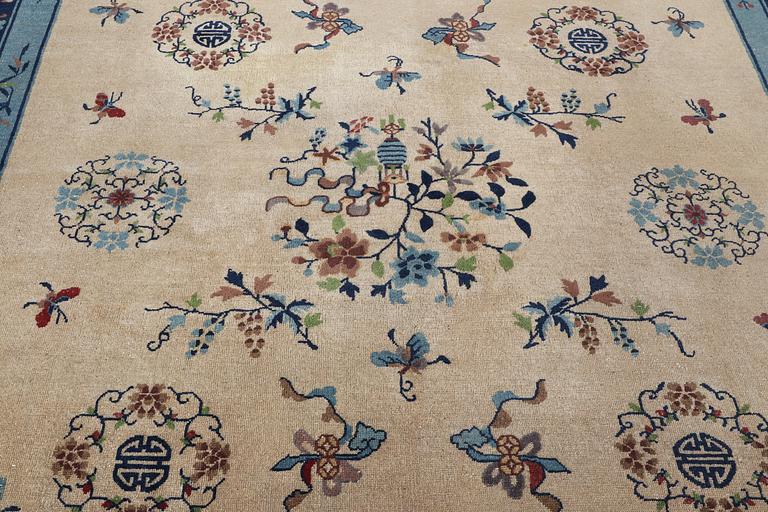 A semi-antique carpet, China, c. 350 x 275 cm.