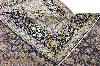 A Kashan carpet, c. 343 x 236 cm.