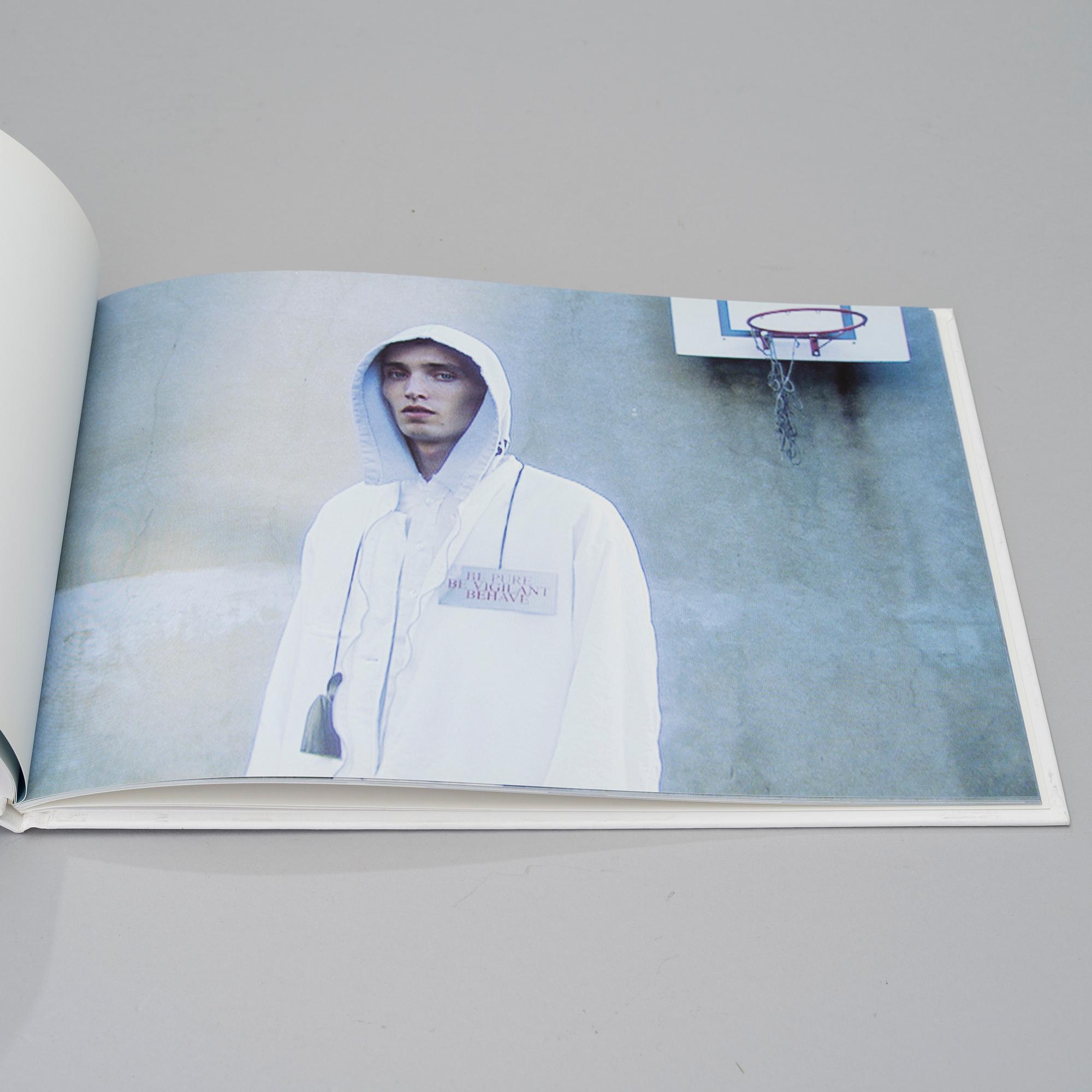 RAF SIMONS, A BOOK, Woe Onto Those Who Spit on the Fear Generation the Wind Will Blow it Back..., signed and numbered.