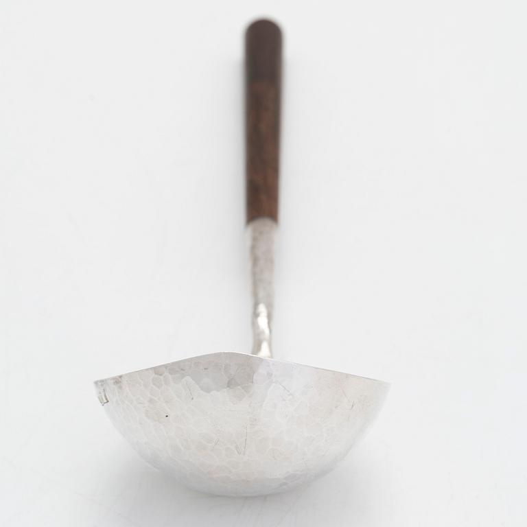 Tapio Wirkkala, a sterling silver and rosewood punch ladle, Kultakeskus, Hämeenlinna, Finland 1972.