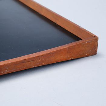 A table tray, model designed by Finn Juhl in 1965.