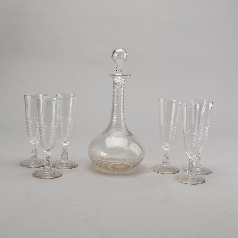10+7 Champagne glasses, decanter, cut decor. First half of 20th century.