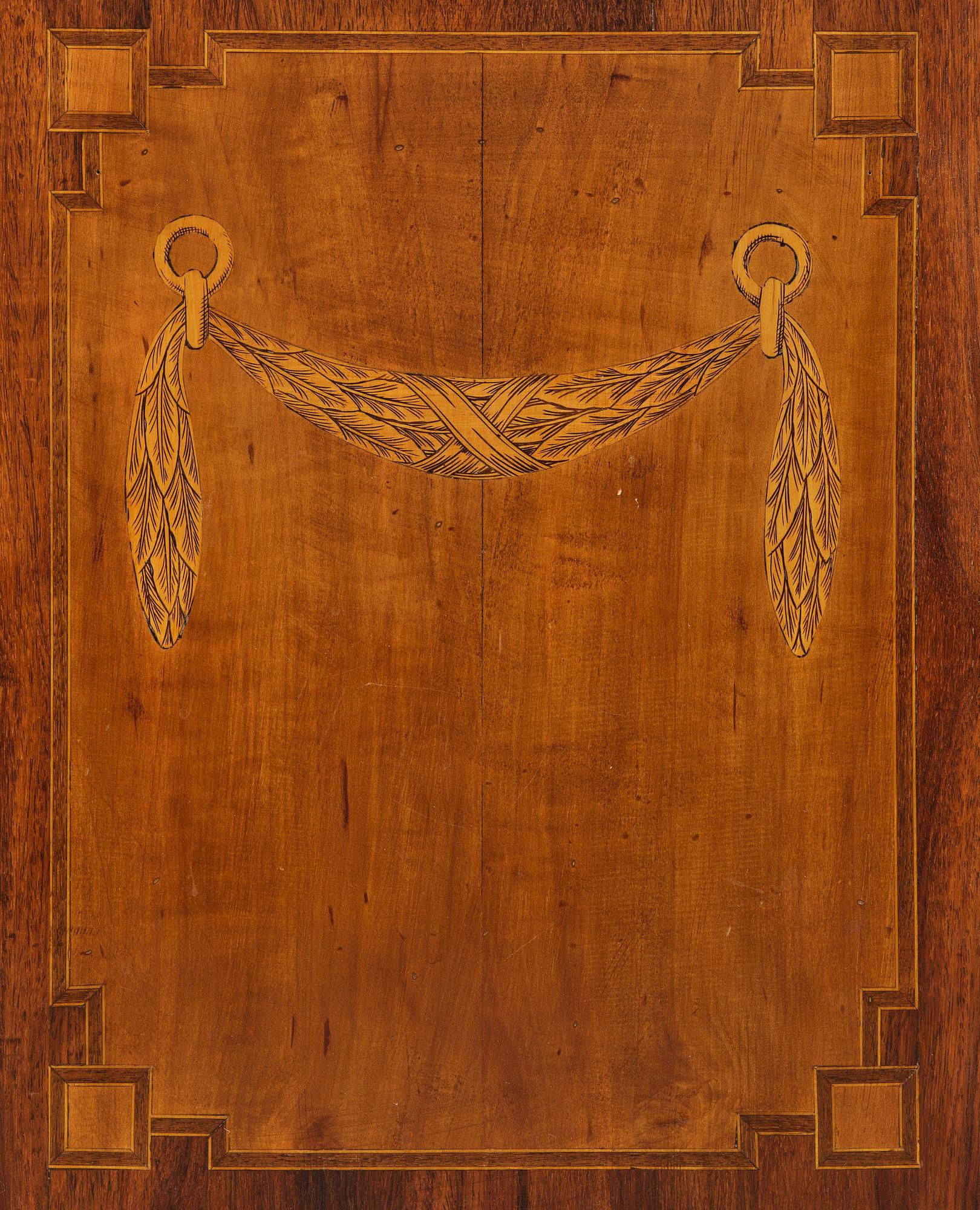 A Gustavian marquetry commode in the manner of F. Foltiern, Stockholm, late 18th century.