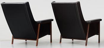 A pair of Karl- Erik Ekselius black leather armchairs, JOC, Vetlanda early 1960's.