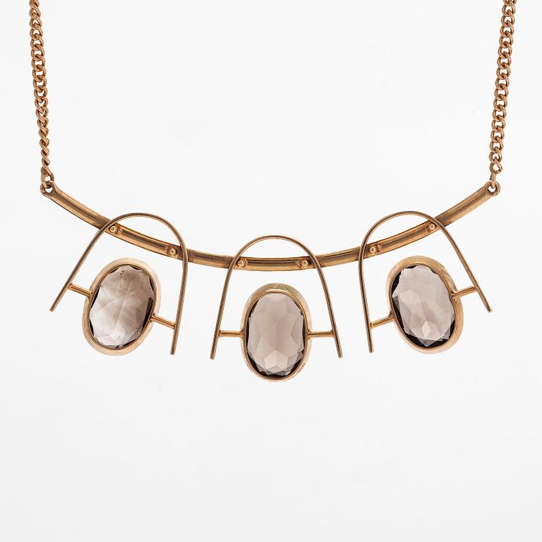 Eero Rislakki, halssmycke, fasettslipade rökkvartser, 14K guld. Westerback, 1960.