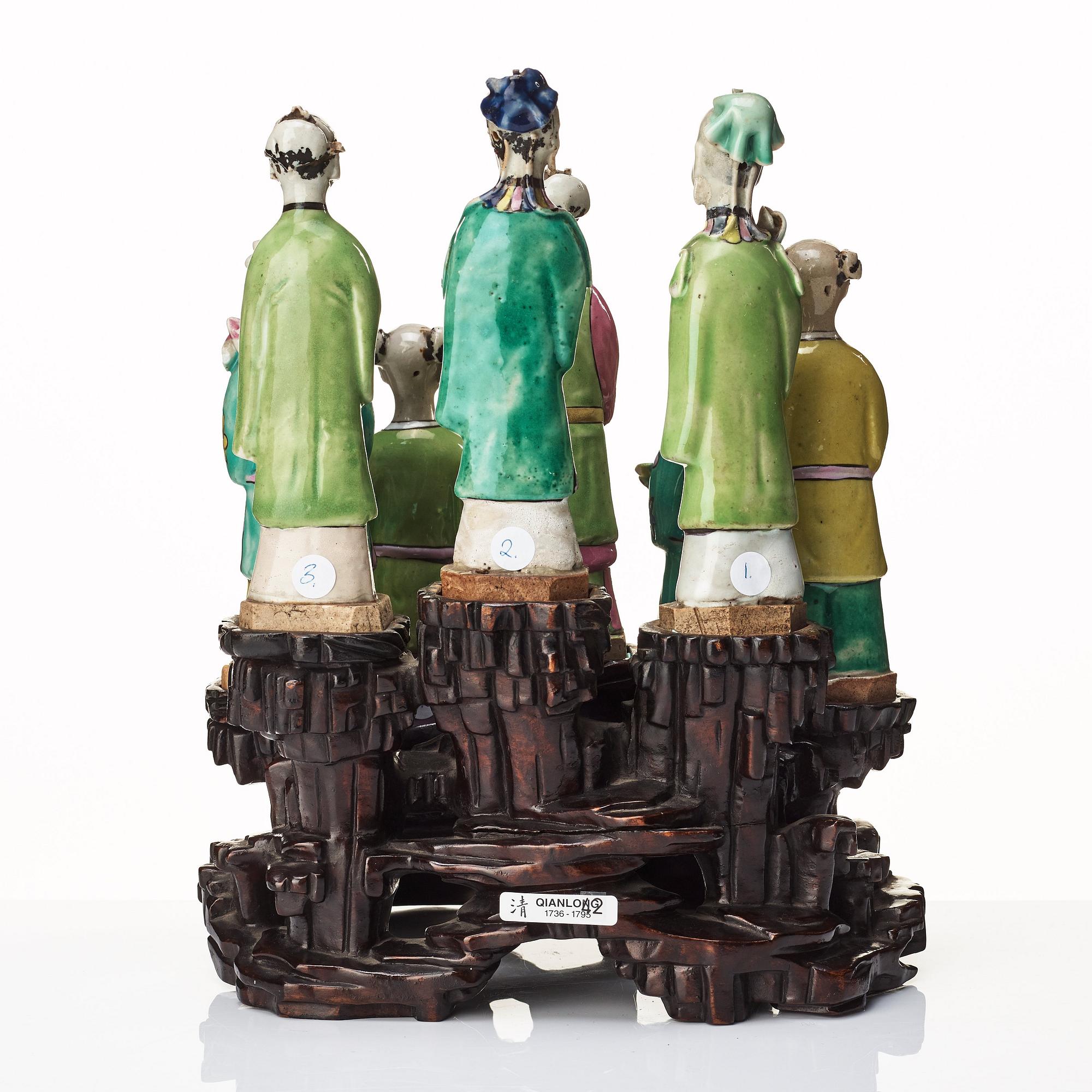 A group of eight immortals on  wooden stand, Qing dynasty, 19th Century.