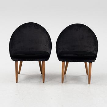 Eyvind Johansson, a pair of '391' easychairs, mid 20th century.