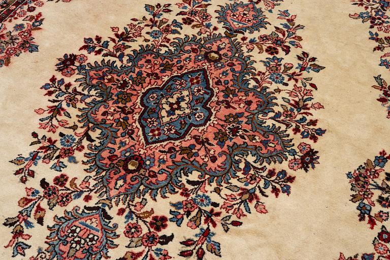 An oriental carpet, c. 370x260 cm.