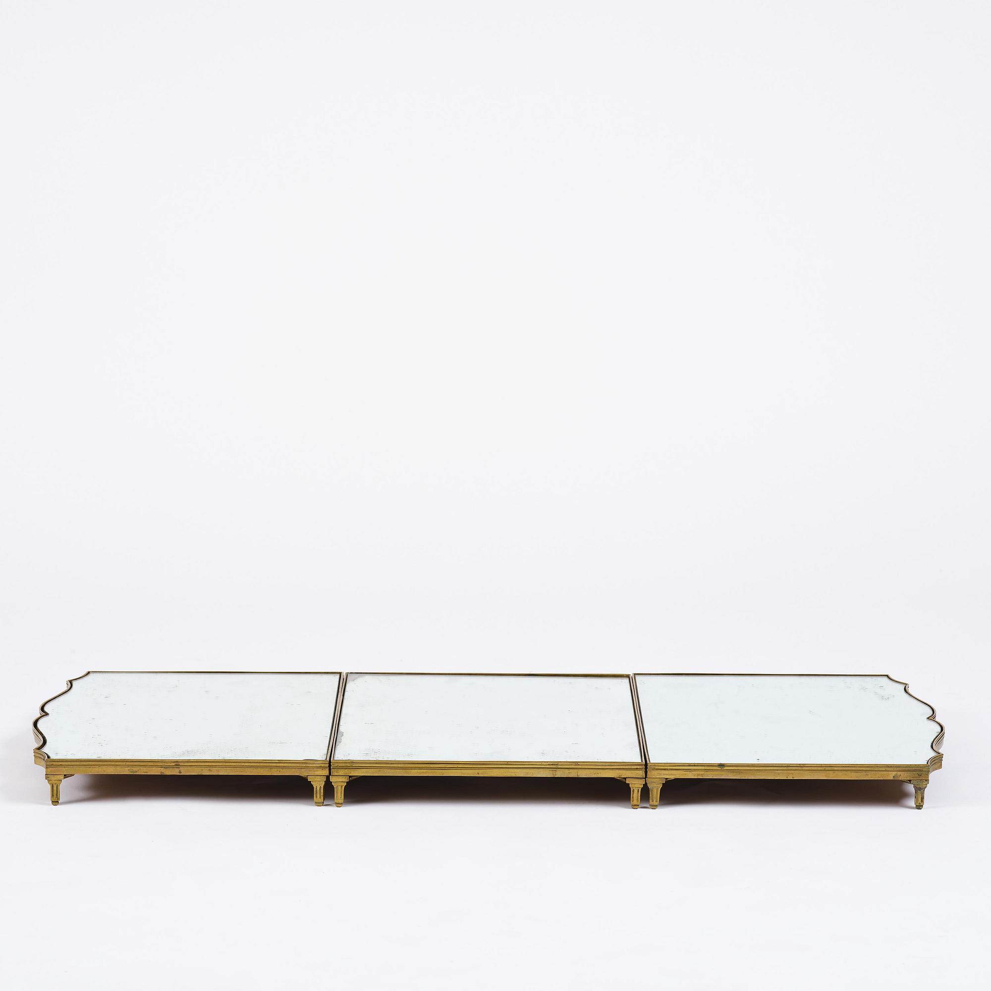 A Gustavian three-piece brass and glass surtout de table, Stockholm, later part 18th century.
