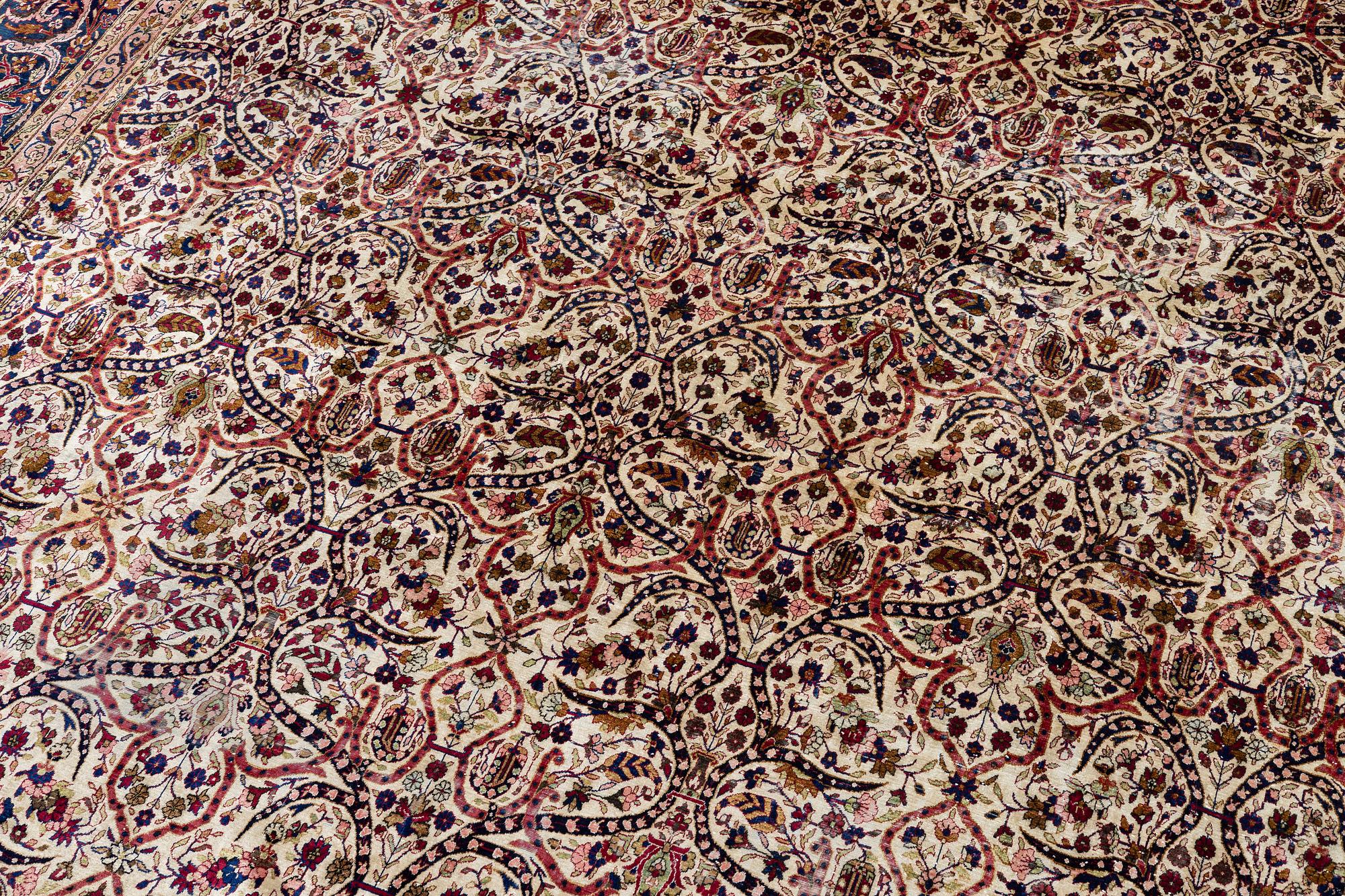An antique silk Keshan of 'Arabesque' design, Central Persia, c. 410 x 297 cm.