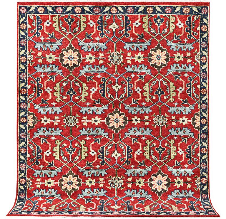 An oriental carpet, c. 301 x 239 cm.